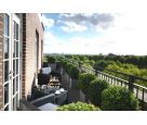 Granite planters with Buxus topiary on 8th floor terrace of Grosvenor House Apartments